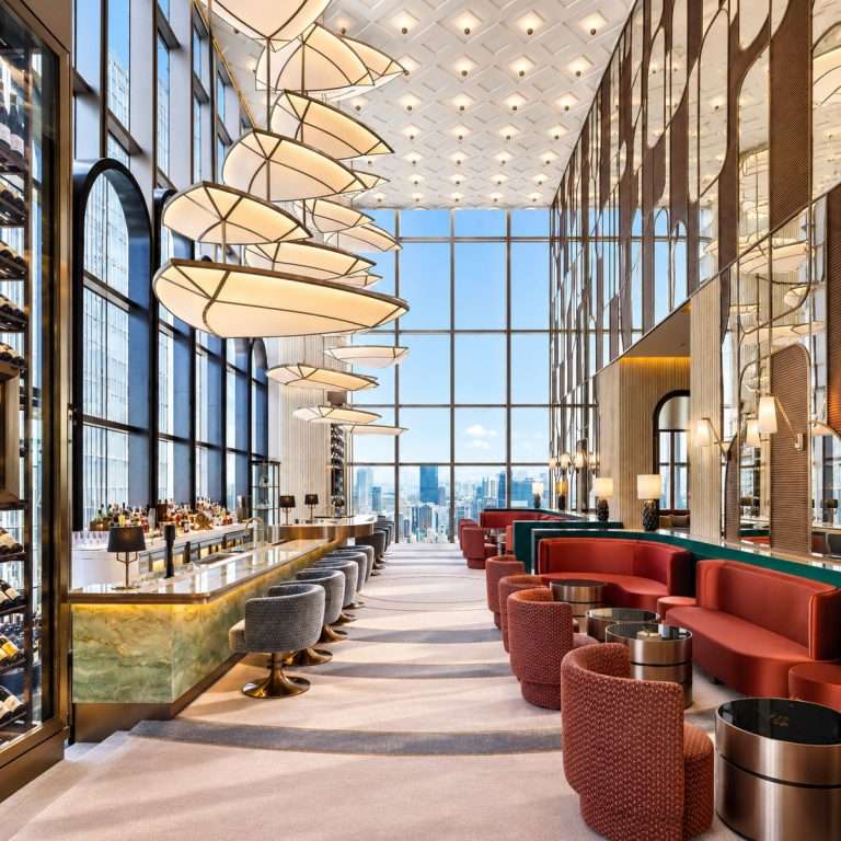 Luxury hotel sky lounge interior with bar counter and lounge seating